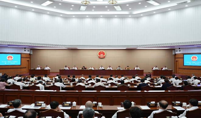 省十四届人大常委会举行第二十二次会议 倪岳峰主持闭幕会议并讲话