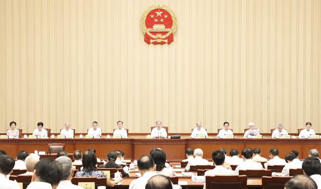 十四届全国人大常委会第二十四次会议在京举行 审议医疗保障法草案、道路...