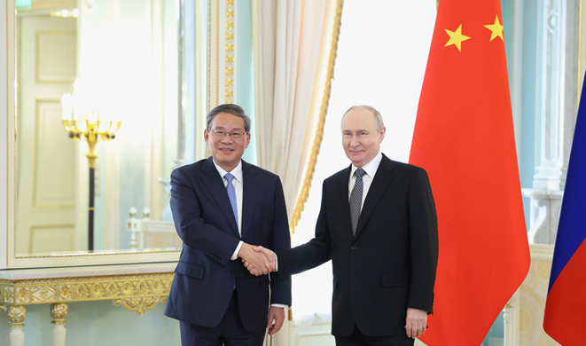 李强会见俄罗斯总统普京